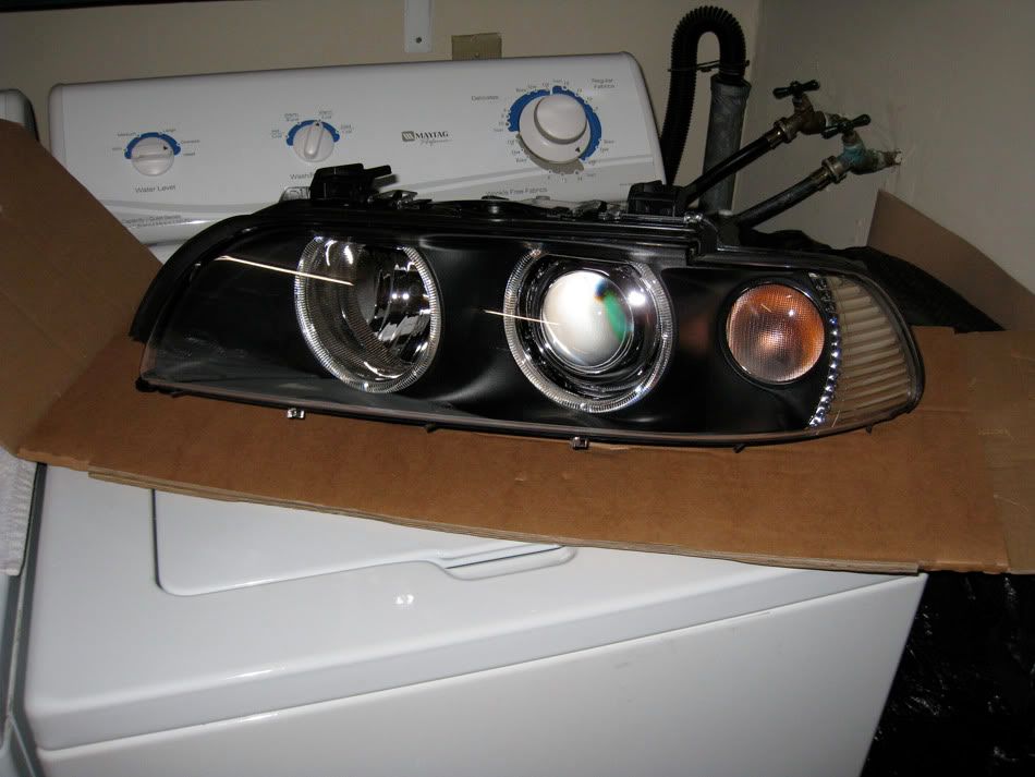 E39 HELLA/OEM headlights (Brand New) / complete set...
